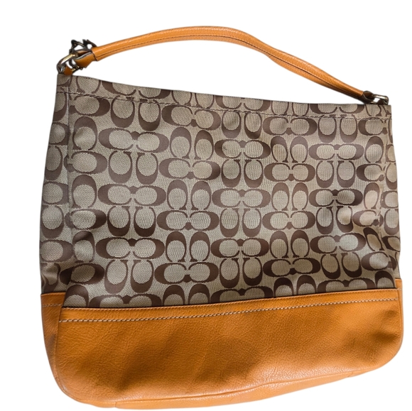 Coach Park Signature Hobo Shoulder Bag model number F23279. 